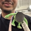 Matthew Hart with a small Mike Wazowski from Monsters Inc on his shoulder wearing an eye patch