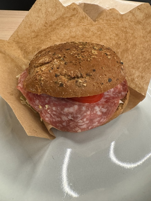 Salami bread roll with various vegetables
